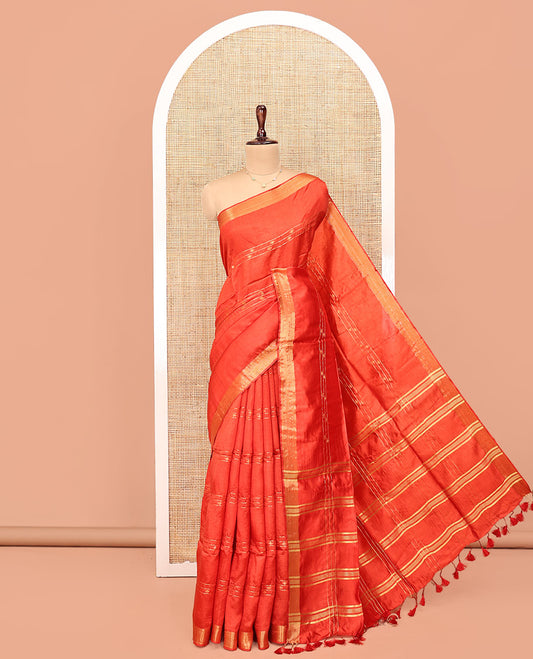 Orange Banana Pith Saree, Decked Up with Buttas and Stripes All Over Its Body, Highlighted by Self-Border, Pallu of Zari Stripes, and Paired with a Matching Blouse
