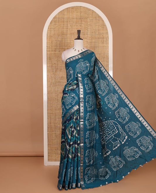 Dark blue-rama blue shibori printed muslin cotton saree, contrast batik elephant print border of zari annam, batik elephant pallu, and contrast polka dots print blouse