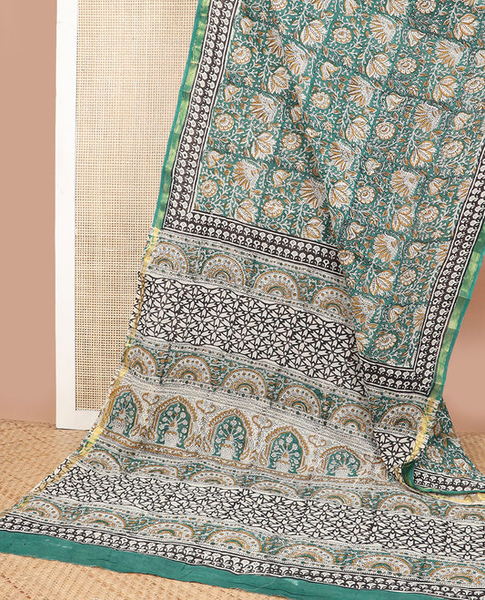 Green floral design machine printed kalamkari cotton saree with contrast zari border & floral design pallu