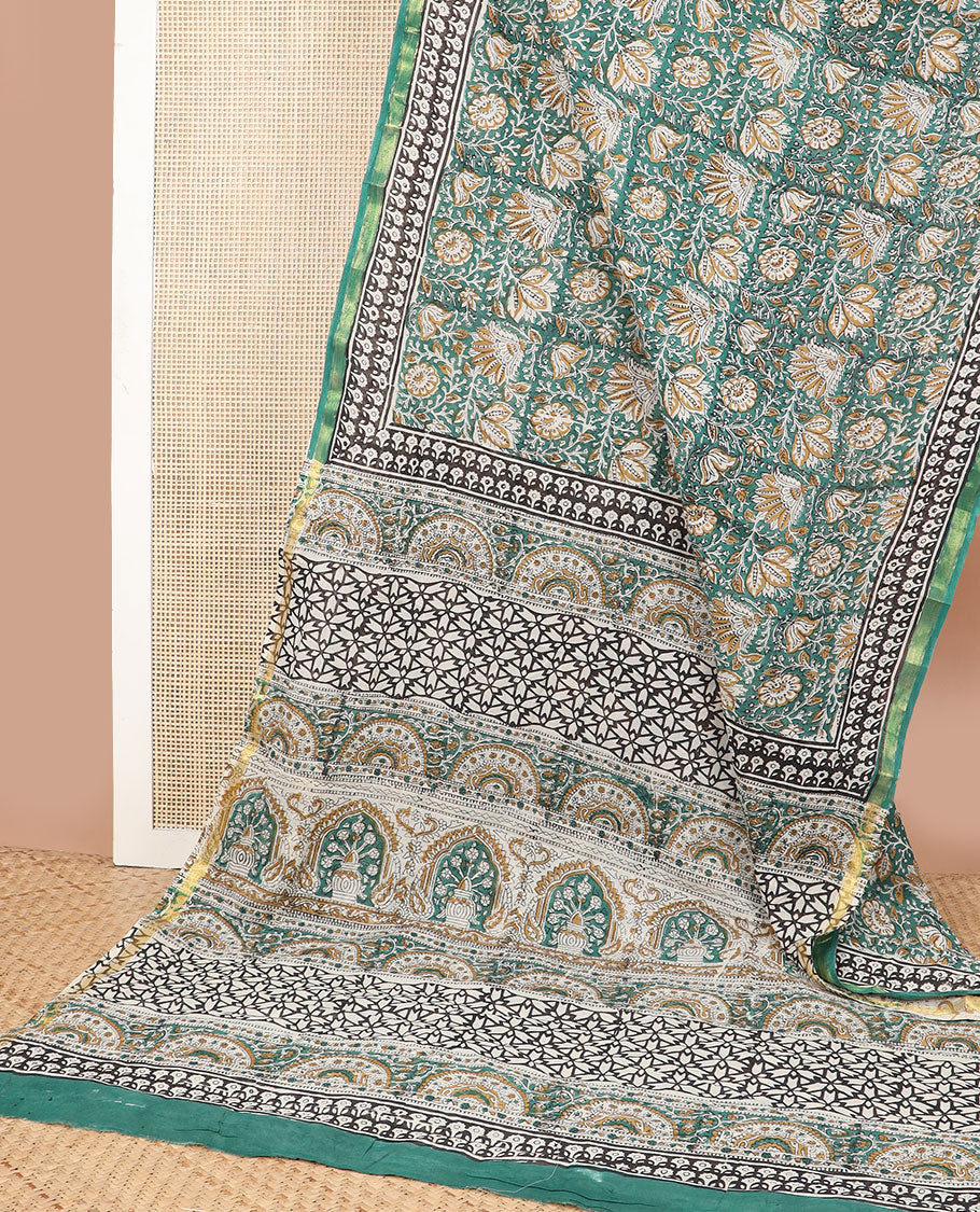 Green floral design machine printed kalamkari cotton saree with contrast zari border & floral design pallu