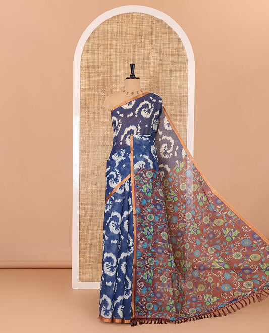 Borderless navy blue shibori printed linen cotton saree, contrast kaleidoscope colored kalamkari floral vine print, and a contrast printed blouse