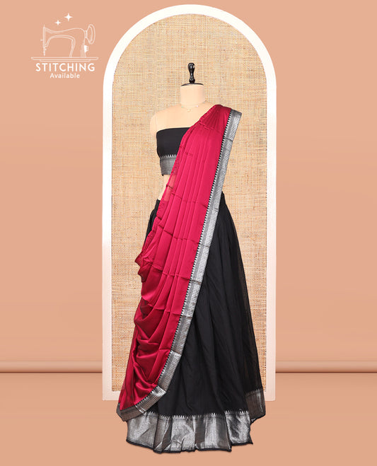 Black Cotton Half-Saree Features Plain Skirt, a Traditional Border, a Matching Blouse, and a Contrast Dhavani