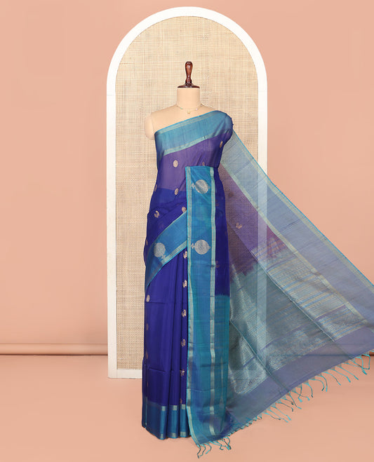 Blue Silk Cotton Saree, Artfully Woven with Peacock and Rudraksham Motifs On Its Body, Complemented by Contrast Zari Motifs Woven Border, Geometric Zari Patterned Pallu and Paired with a Contrast Blouse