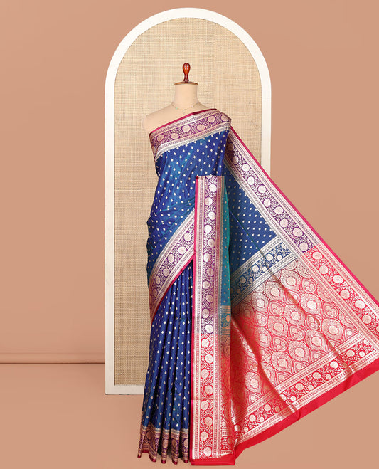 Blue Semi-Banaras Saree, Beautified with Buttas on Its Body, Complemented by a Contrast Floral Creeper Design Border, Intricately Designed Pallu, and Paired with a Contrast Blouse