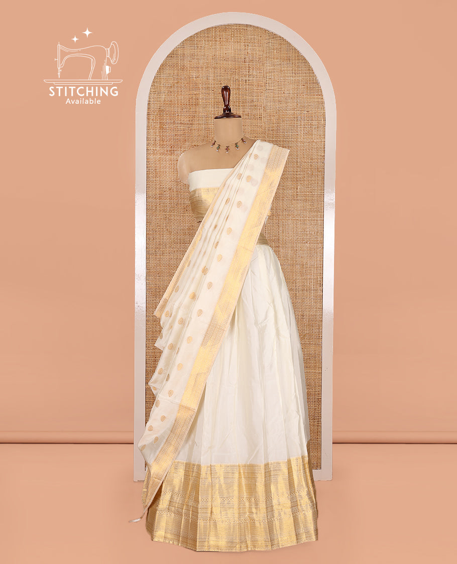 Cream Banarasi Silk Half-Saree Features a Plain Skirt, a Traditional Border, Matching Blouse, and Zari-Woven Dhavani