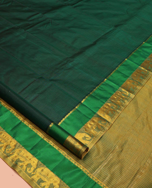 Green Kanchipuram Silk Saree, Sparsely Woven with Vazhaipoo Stripes on Its Body, Complemented by Contrast Rettai Pettu Border of Salngai, and Yaanai Designs, Zari-Striped Pallu, and Paired with a Contrast Blouse