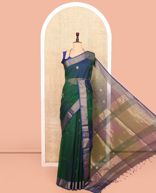Green Maheswari Cotton Saree, Bedecked with Zari Buttas All Over Its Body, Complemented by Contrast Border of Traditional Zari Designs, Zari Decked Up Pallu and Paired with a Matching Blouse