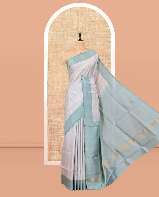 Light Grey Striped Uppada Silk Saree, Complemented by a Contrast Border, Plain Pallu, and a Contrast Blouse