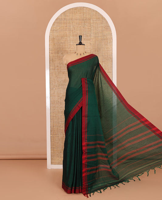 Green plain mercerised cotton saree, contrast temple plain border, striped pallu, and a matching blouse