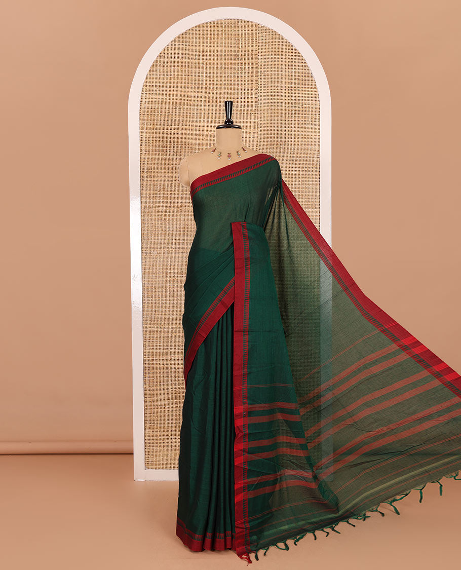 Green plain mercerised cotton saree, contrast temple plain border, striped pallu, and a matching blouse