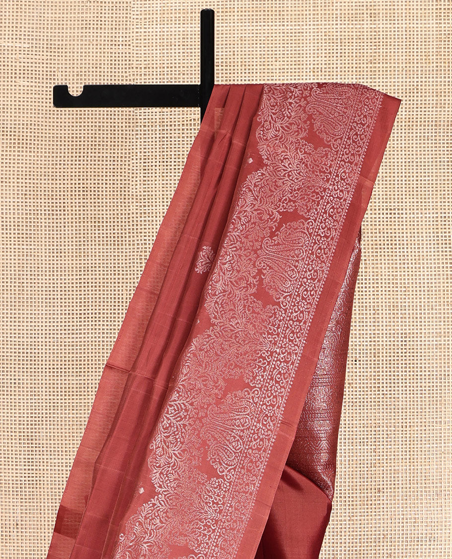 Red Mayuri Soft Silk Saree, Graced with Zari Buttas, a Self-Border, and a Pallu Features an Intricate Weave and a Matching Blouse
