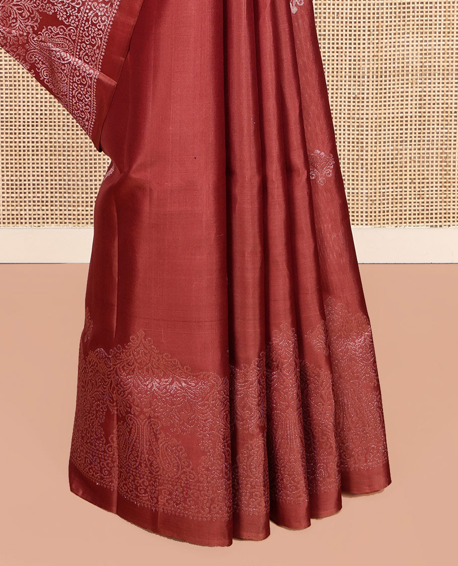 Red Mayuri Soft Silk Saree, Graced with Zari Buttas, a Self-Border, and a Pallu Features an Intricate Weave and a Matching Blouse
