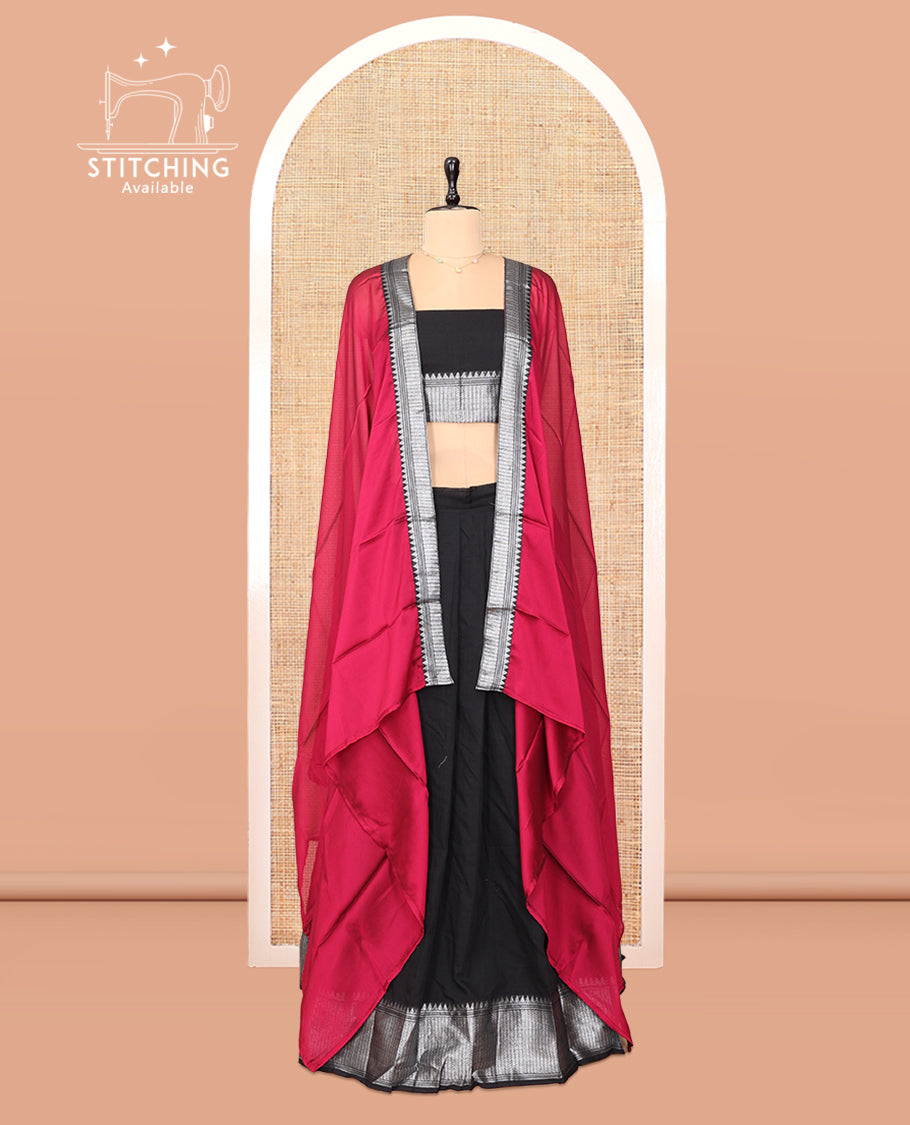 Black Cotton Half-Saree Features Plain Skirt, a Traditional Border, a Matching Blouse, and a Contrast Dhavani