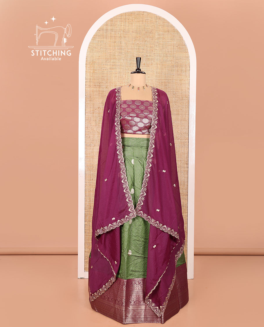 Mehendi Green and Purple Banarasi Silk Half-Saree Featuring Micro-Checks and Chakram Buttas Woven Skirt, Complemented by Contrast Traditional Zari Design Border, Paired with a Jacquard Blouse, and a Rangoli Georgette Embroidered Dhavani