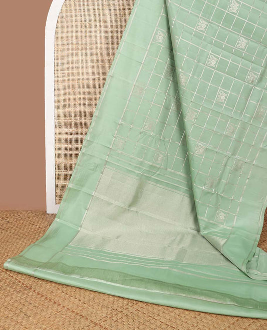 Green checked, buttas silk saree with self zari border & jaal design pallu