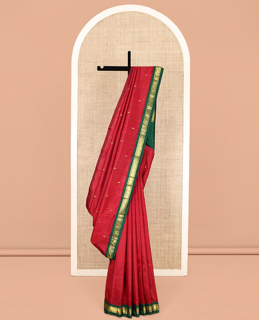 Red Kanchipuram Silk Saree Featuring Zari Buttas, Complemented by a Contrast One-Sided Korvai Zari Design Border, Zari Design Pallu, and No Blouse