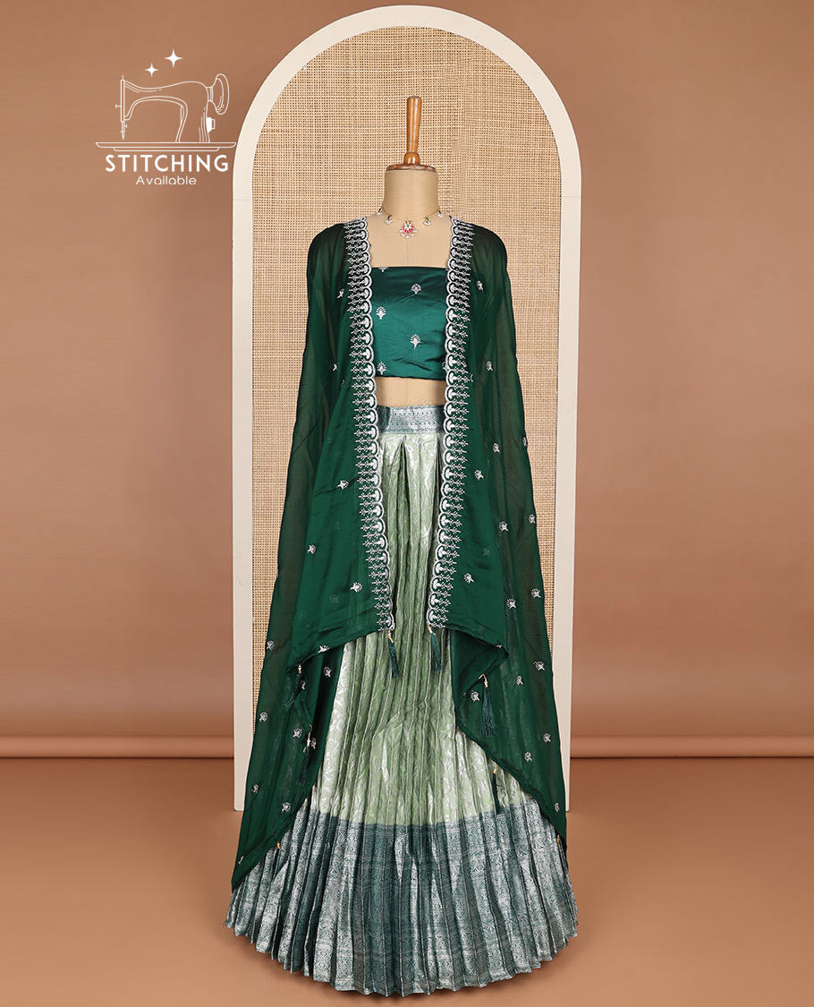 Green floral jacquard half saree with contrast intricate zari border, embroidered blouse & floral embroidery scallop border dhavani