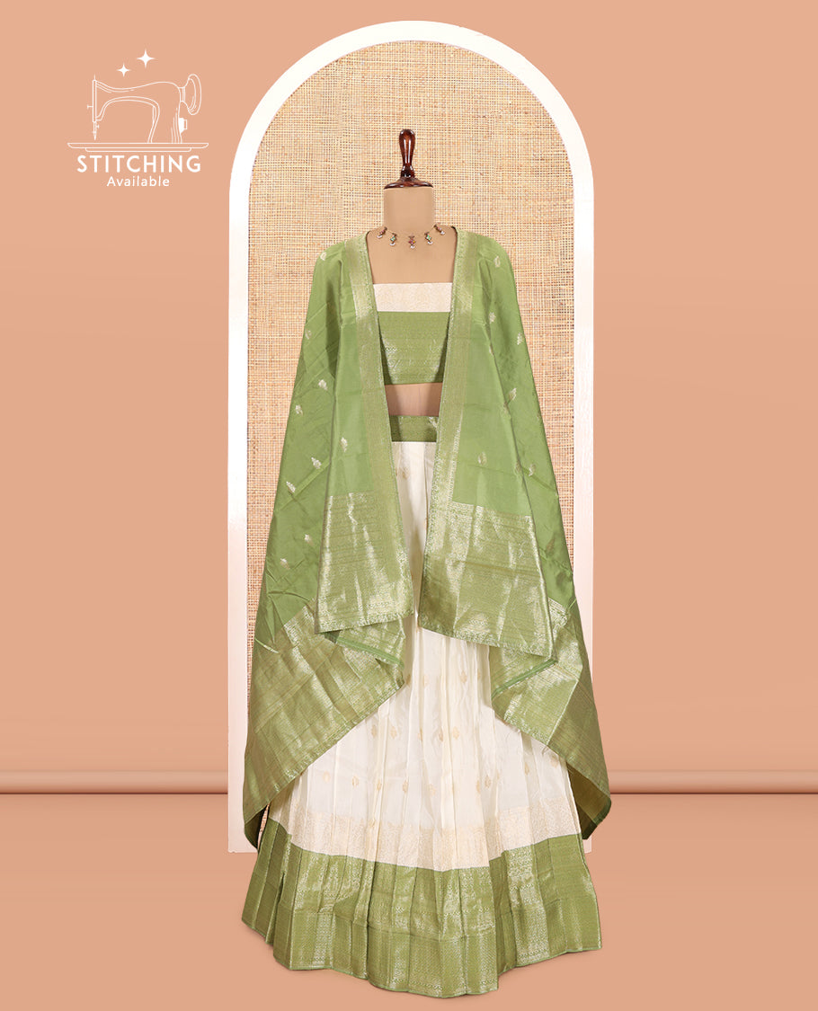 Cream-Olive Green Semi-Silk Half-Saree, Subtly Sparkled with Zari Buttas Skirt, a Contrast Traditional Zari Border, and a Contrast Dhavani
