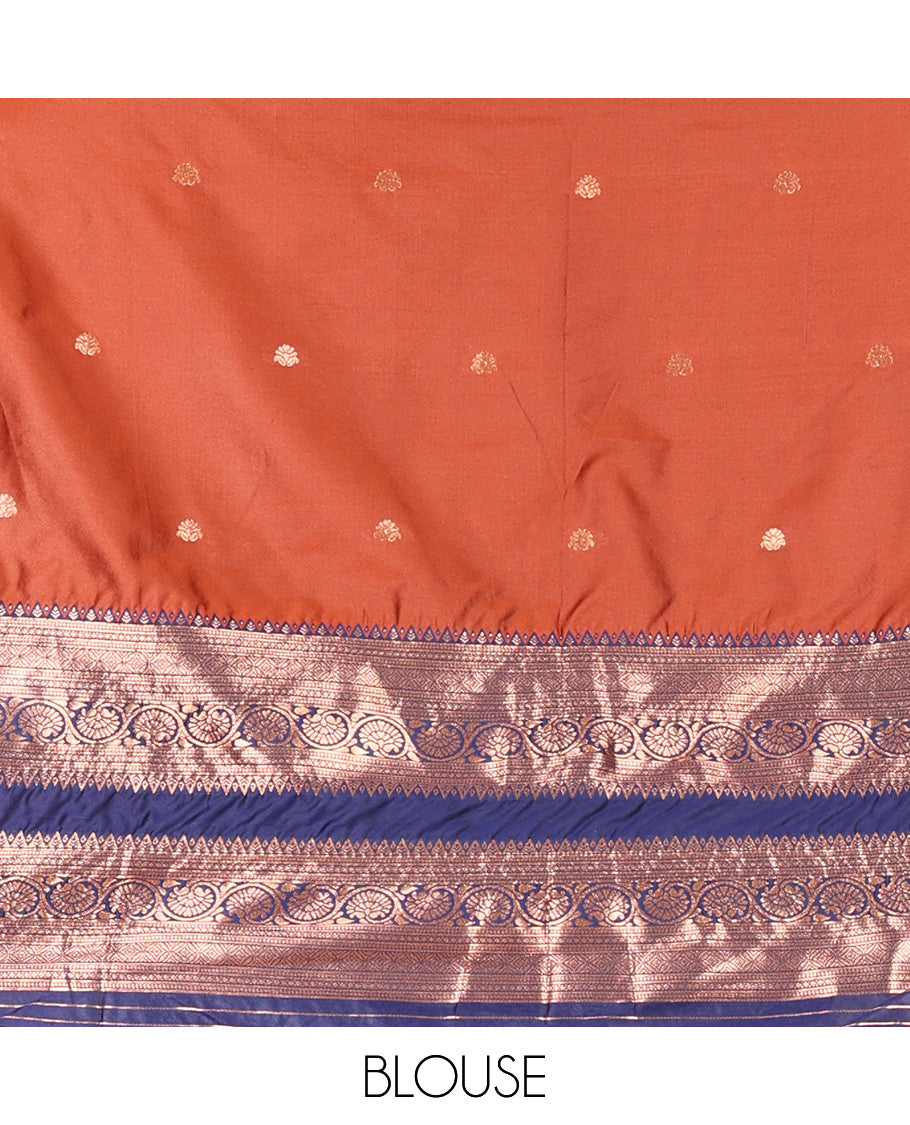 Rust and Blue Semi-Banarasi Half-Saree Featuring Zari Buttas Skirt, Complemented by Contrast Rettai Pettu, Traditional Border of Floral Creeper Designs, Paired with a Matching Blouse, and a Satin Georgette Embroidered Scallop Dhavani