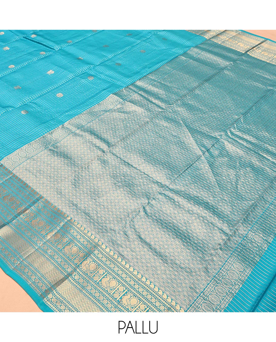 Blue Vasundhara Lite Silk Mix Saree, Richly Detailed with Zari Buttas and Zari Checks All Over Its Body, Highlighted by a Zari Border of Manga, Neli, Kamalam, Mayil, and Vanki Designs, Gleaming Intricately Designed Pallu, and Paired with a Matching Blouse