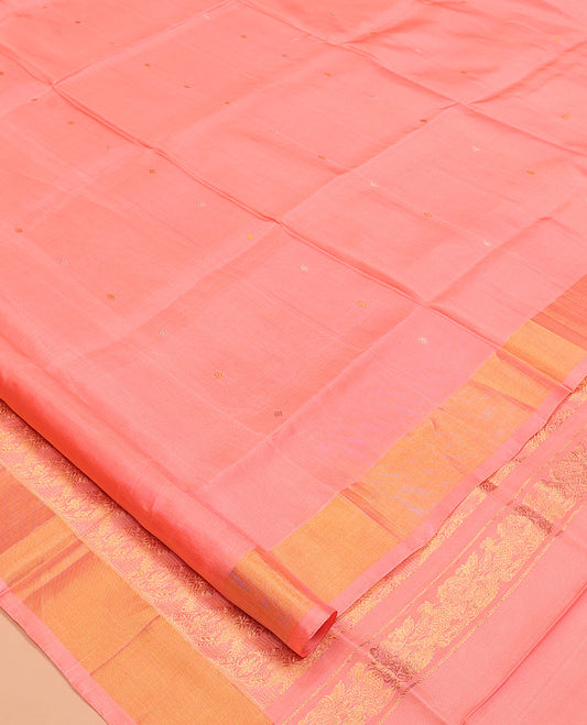 Coral Pink Uppada Silk Saree, Dazzled with Zari Buttas, a Bavanji Border, Grand Floral Jaal Pallu, and a Matching Blouse
