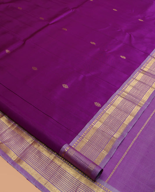 Purple Kanchipuram Silk Saree, Embellished with Zari Buttas, a Contrast One-Sided Border of Paneer Sombu, Banaras and Diamond Design, Zari Design Pallu, and No Blouse