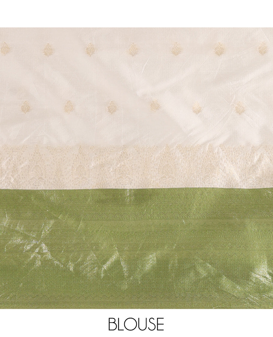 Cream-Olive Green Semi-Silk Half-Saree, Subtly Sparkled with Zari Buttas Skirt, a Contrast Traditional Zari Border, and a Contrast Dhavani