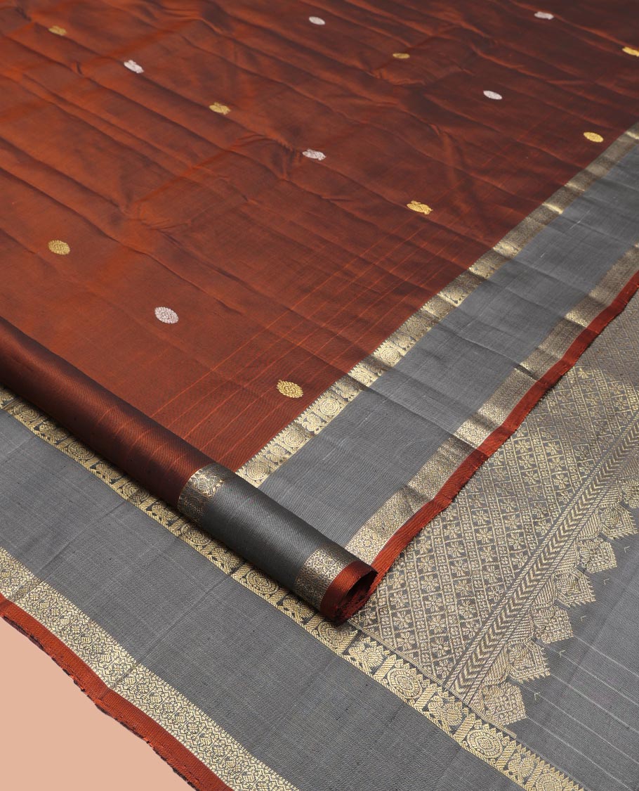 Brown Kanchipuram Silk Saree, Artfully Detailed with Mayil-Chakram Buttas, a Contrast Rettai Pettu Border of Mayil and Chakram Designs, Jaal Pallu, and a Contrast Blouse