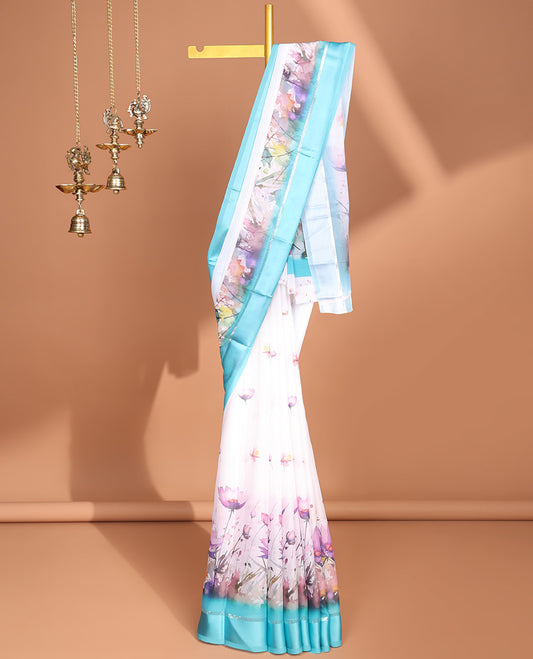 White digital floral design moss chiffon saree with contrast blue zari border & floral design pallu
