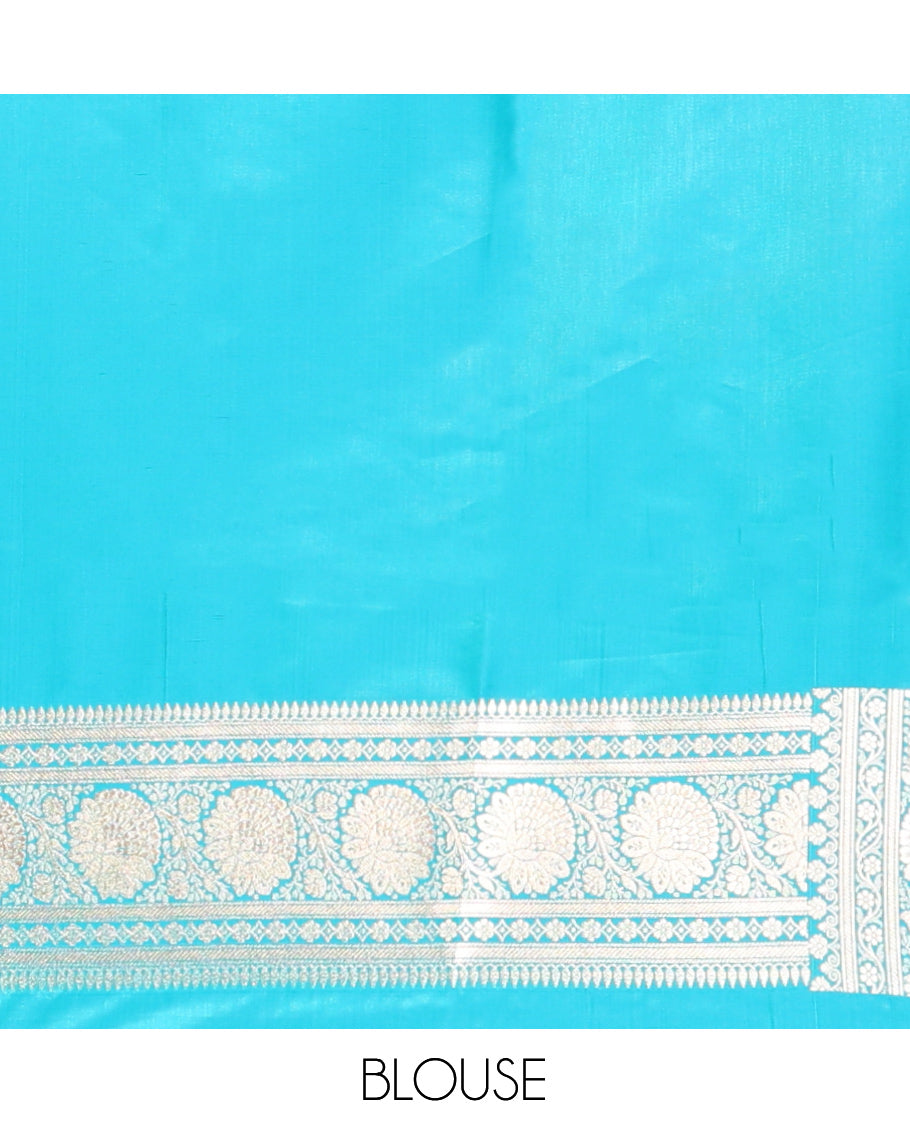 Blue Banarasi Nylon Saree, Elevated with Floral Buttas, Zari Floral Creeper Border, Intricate Pallu, and a Matching Blouse