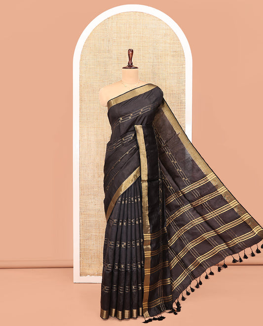 Black Banana Pith Saree, Enthralled with Buttas and Stripes on Its Body, Subtly Zari Border, Pallu Steeped with Zari Stripes, and Paired with a Matching Blouse