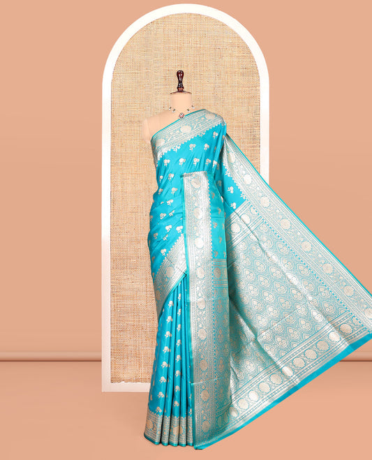 Blue Banarasi Nylon Saree, Elevated with Floral Buttas, Zari Floral Creeper Border, Intricate Pallu, and a Matching Blouse