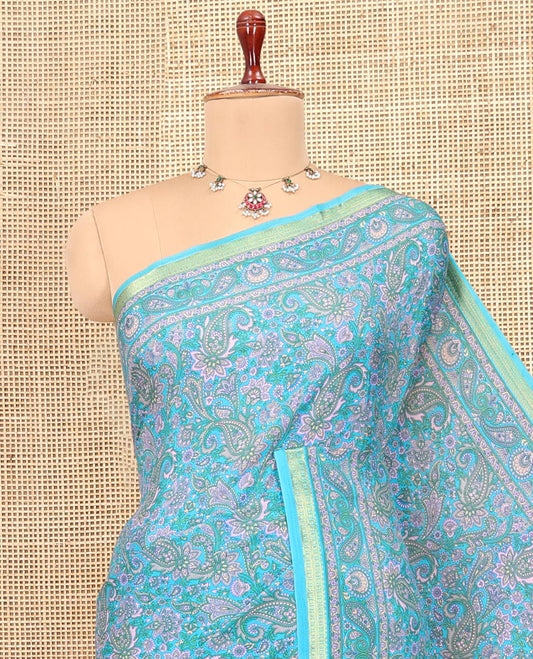 Blue Printed Silk Saree, Bedecked with Paisley Print, a Zari Border, Paisley Printed Pallu, and a Matching Blouse