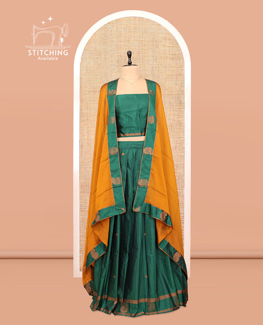 Green Cotton Half-Saree Features Buttas Skirt, a Paisley Border, a Matching Blouse, and a Contrast Dhavani