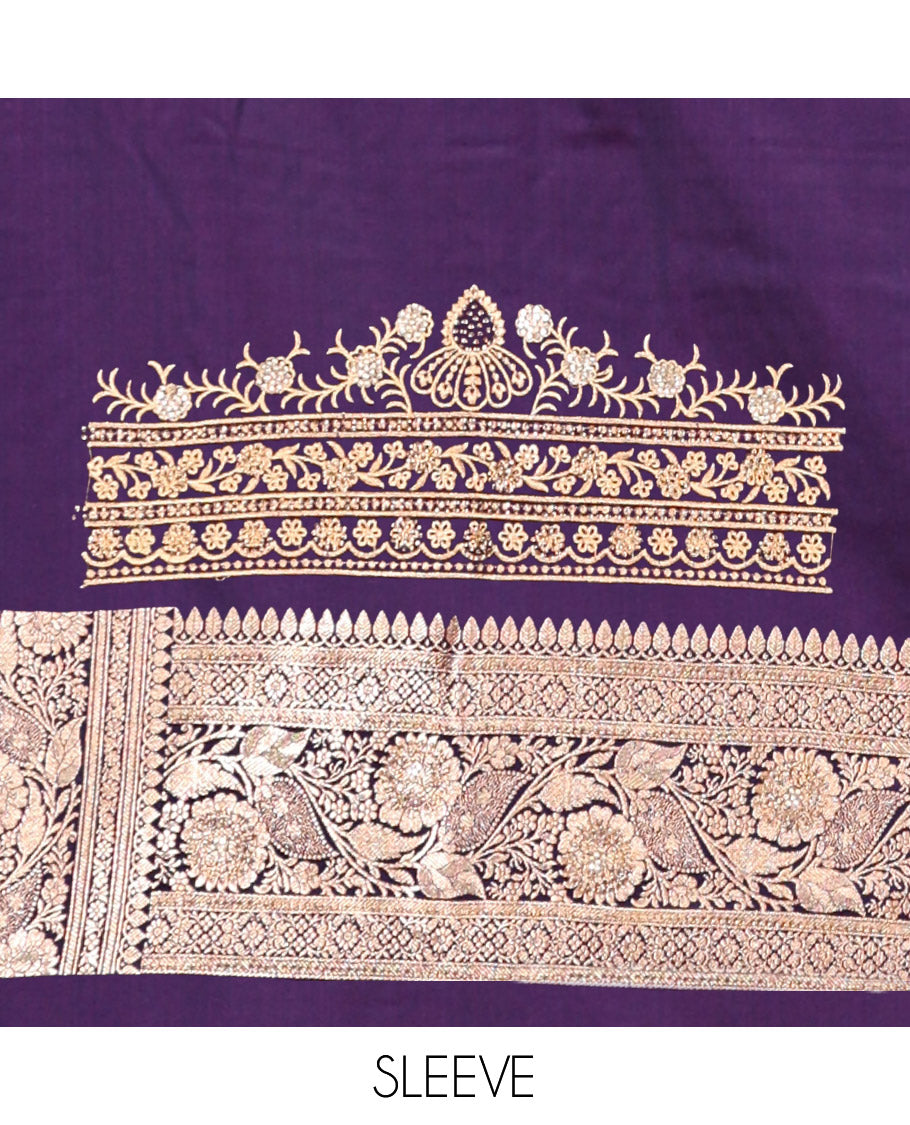 Dark Purple Banarasi Satin Saree, Ornamented with Zari Buttas, a Floral Creeper Border, Intricate Stonework Pallu, and a Matching Blouse