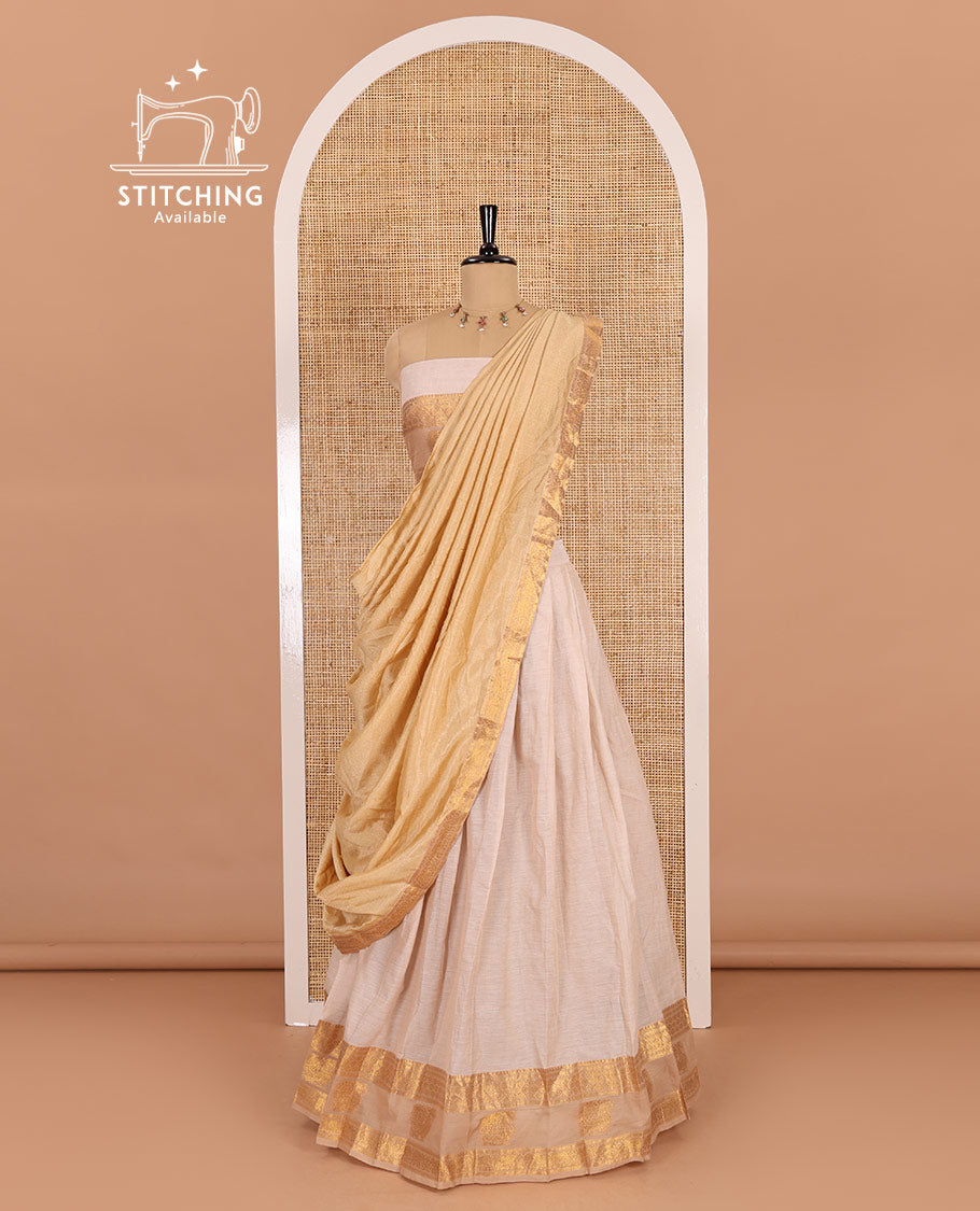 Cream-chikku sungudi cotton half-saree, plain with contrast traditional zari peacock motif bordered skirt, matching blouse, and a zari bordered dhavani