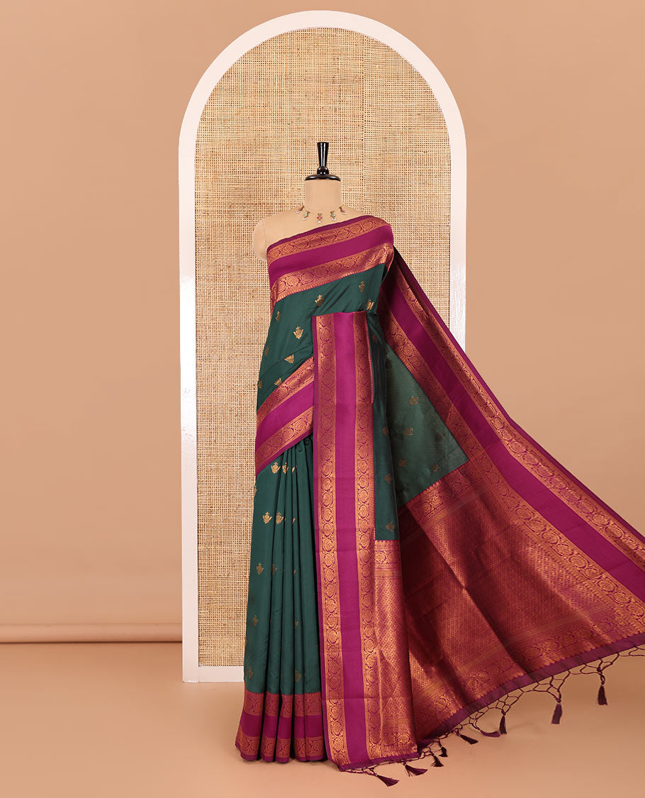 Green copper zari buttas elite soft silk saree , contrast zari weaving border , contrast brocade rich pallu with tussels , and  contrast brocade blouse