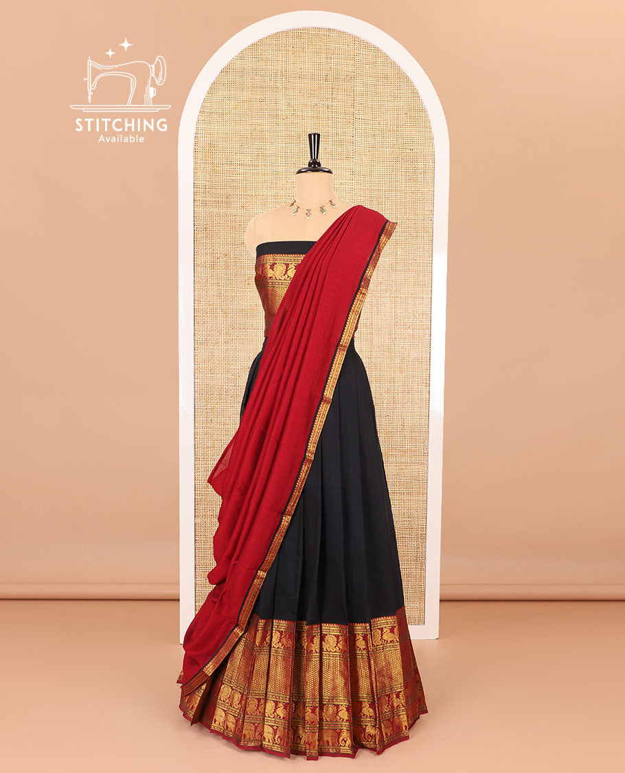 Black half-saree, plain with contrast traditional zari border skirt, matching blouse and a contrast zari border dhavani