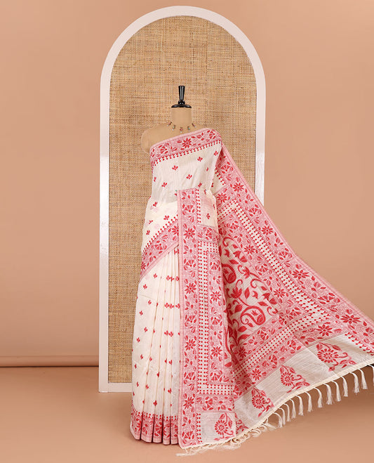 Half-white and red floral thread buttas woven jute cotton saree, floral thread weave border, floral-paisley weave pallu, and a matching blouse