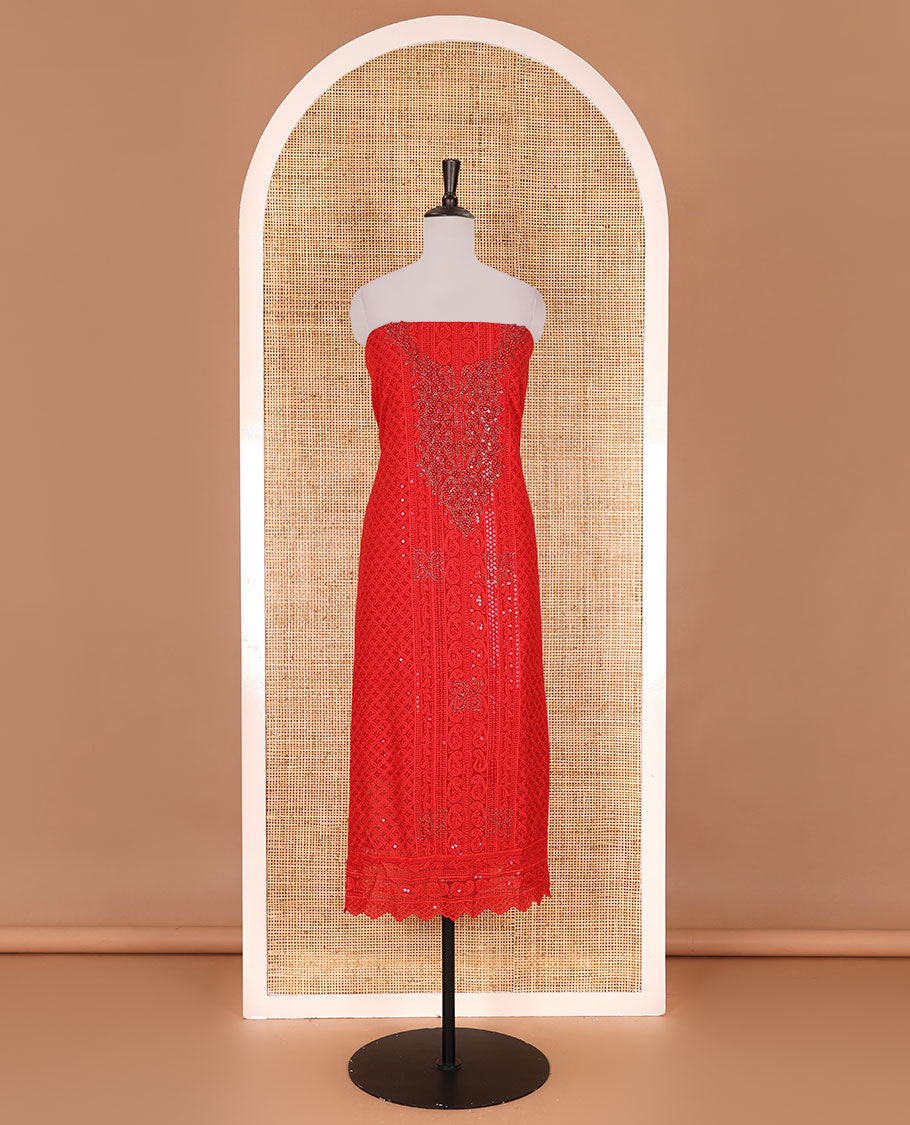 Red material churidar set, stone work with Schiffli style embroidered georgette top, American Crape bottom, and polka dotted printed mirror work dupatta