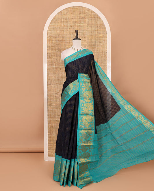 Navy blue zari checked Sungudi cotton saree, contrast zari border decked up with peacock motifs, zari striped pallu & contrast veldhari stripes blouse