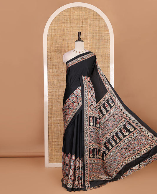 Black plain gajji silk saree with ajrak printed border, ajrak printed geometric pallu, and printed blouse