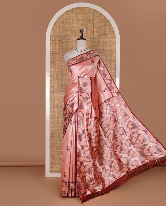 Peach jacquard kanchi silk saree, contrast border, and pallu steeped with paisley motifs with contrast zari design blouse