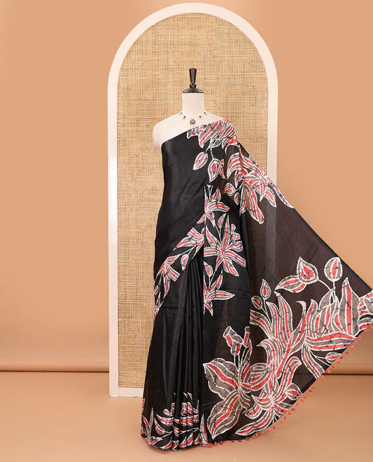 Black-base plain body khadi cotton saree with batik-style orange-color floral printed border & pallu, line-type blouse