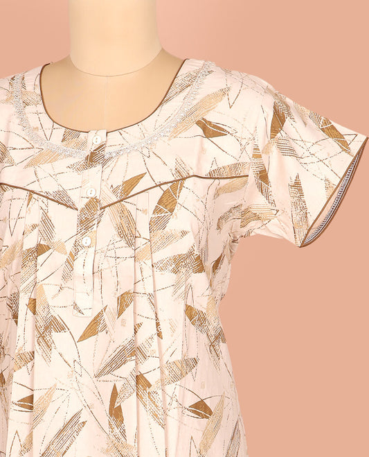 Light Sandal Cotton Nighty Adorned with Geometric Patterns Print, Featuring Neck Lace Work, Round Front Neck, and Half-Sleeves