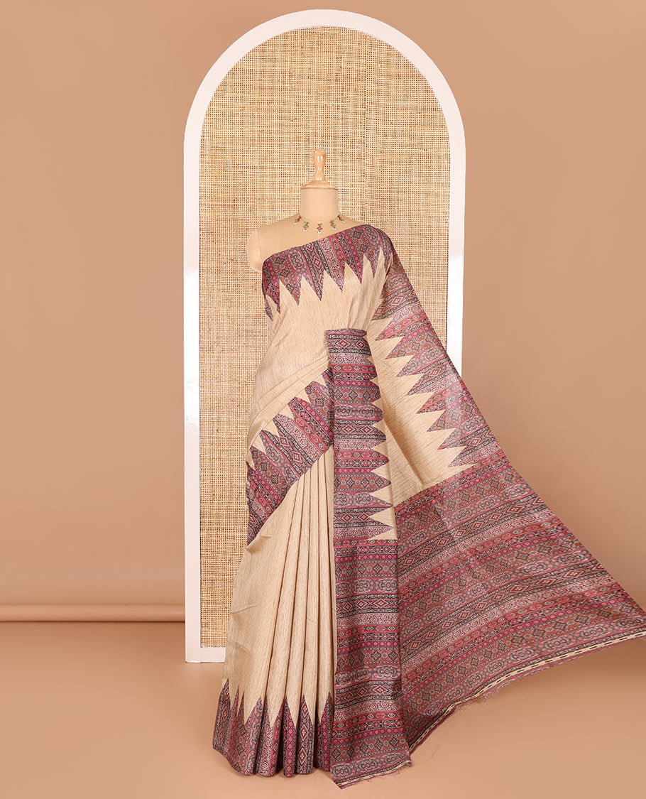 Chikku and purple plain Khicha Tussar saree, temple border of intricate Ajrakh print, Ajrakh printed pallu, and contrast Ajrakh printed blouse