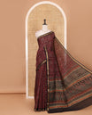 Maroon Ajrakh-style printed Muslin cotton saree, contrast zari border, Ajrakh printed pallu & contarst buttas printed blouse