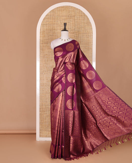 Purple jacquard kanchi tissue saree, zari chakram motifs border, intricately zari woven pallu, and a matching zari design blouse