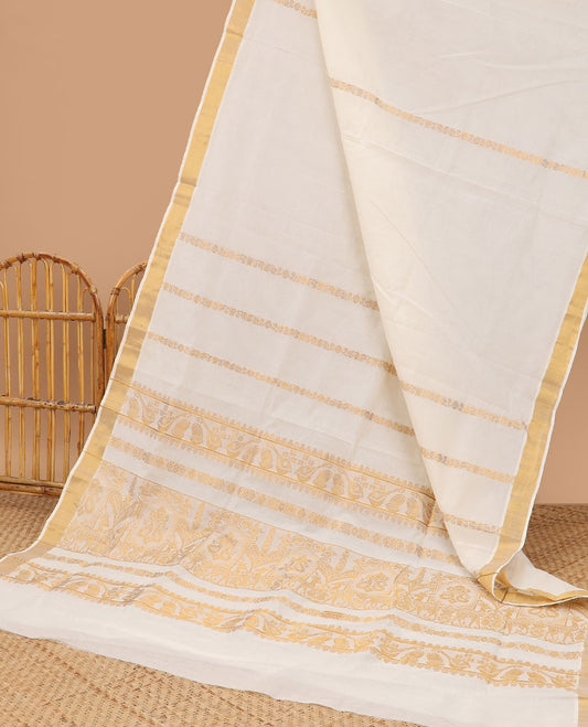 Cream kerala saree with zari designs, zari border & pallu of traditional designs in zari