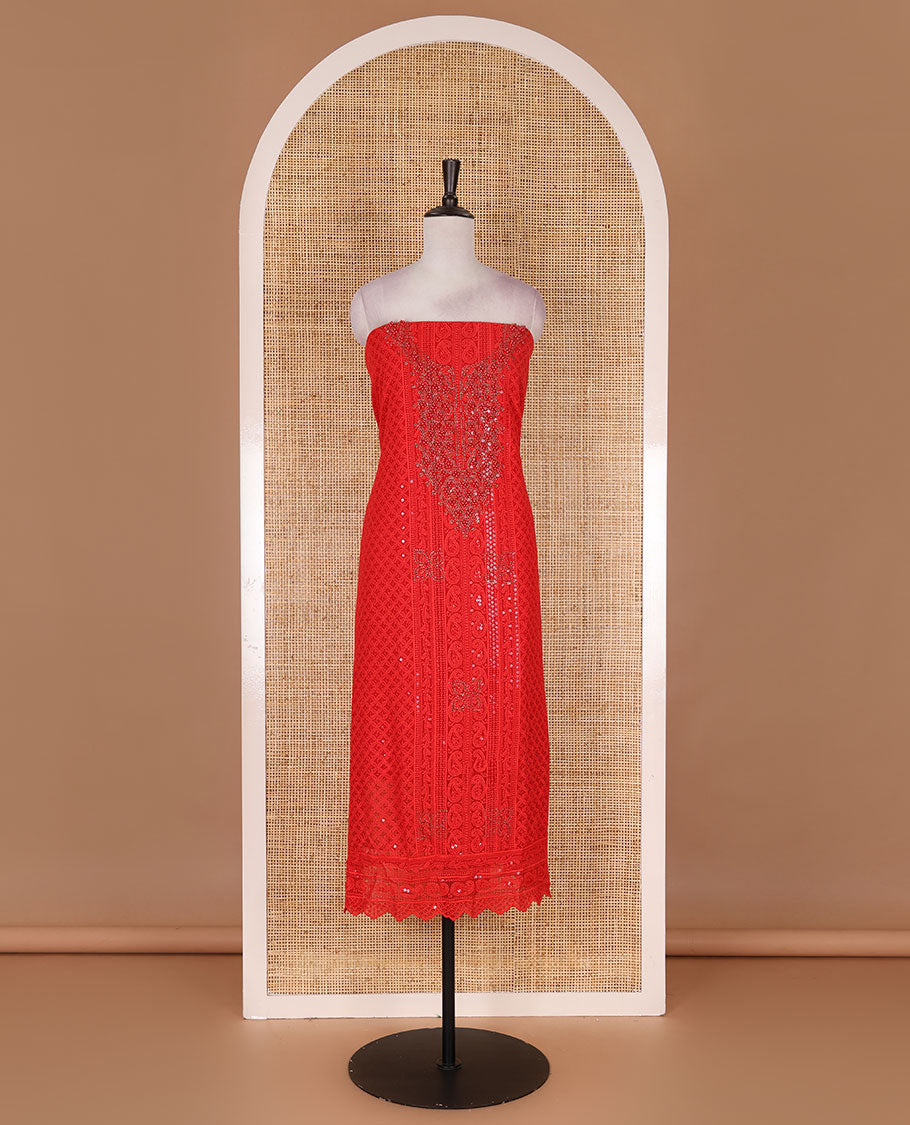 Red material churidar set, stone work with Schiffli style embroidered georgette top, American Crape bottom, and polka dotted printed mirror work dupatta